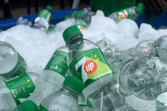 Seven-Up teaser campaign with yellow-capped bottles